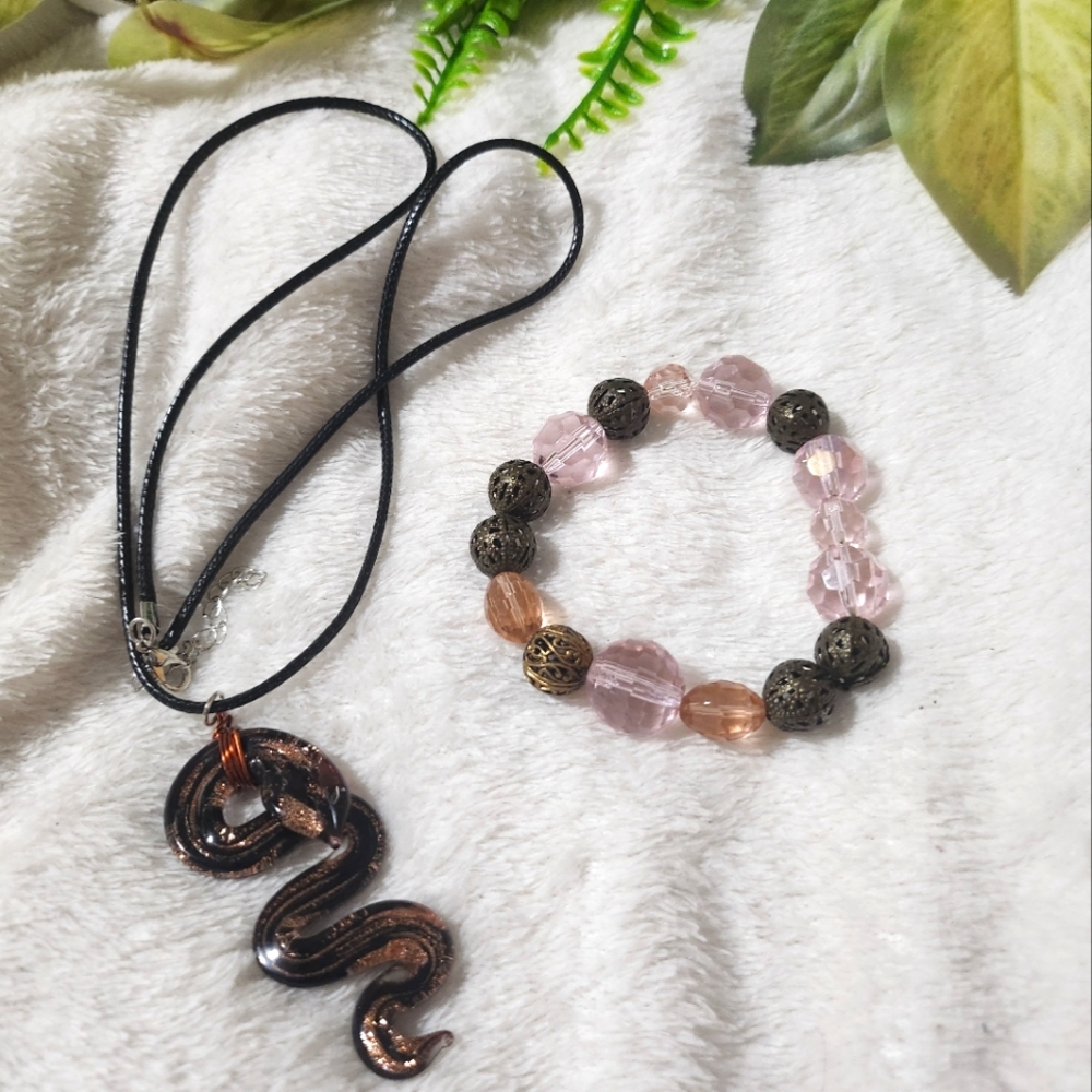 Handmade beaded braclet and necklace with serpent charm